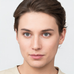 Neutral white young-adult female with short  brown hair and brown eyes