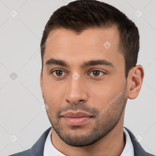 Neutral white young-adult male with short  brown hair and brown eyes