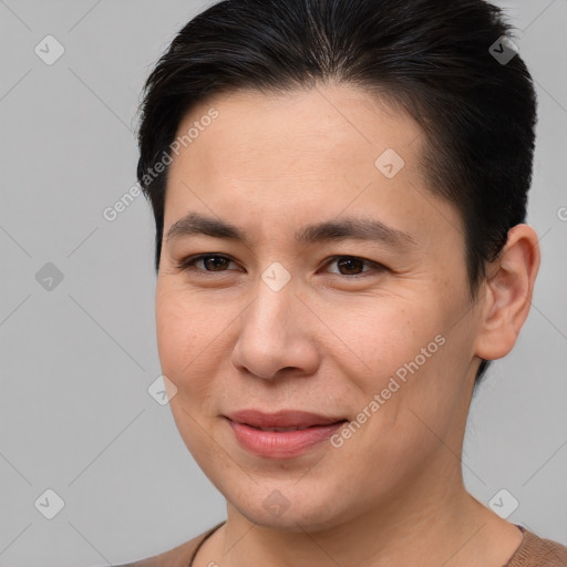 Joyful white young-adult female with short  brown hair and brown eyes