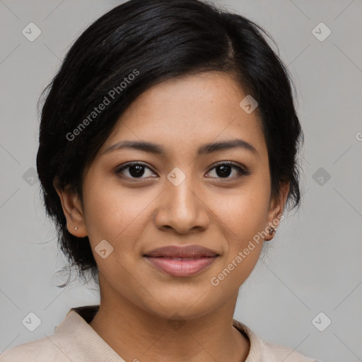 Joyful latino young-adult female with medium  black hair and brown eyes