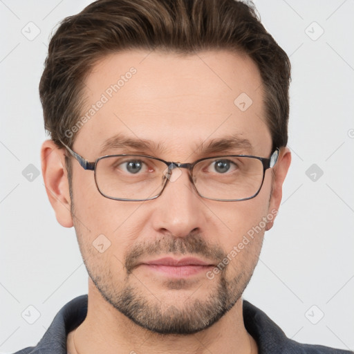 Joyful white adult male with short  brown hair and grey eyes