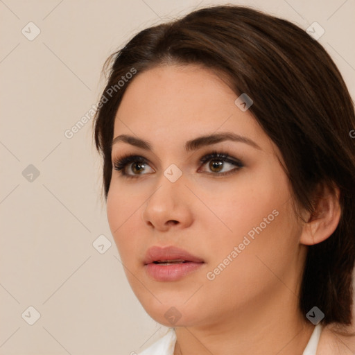 Neutral white young-adult female with medium  brown hair and brown eyes