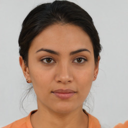 Neutral asian young-adult female with medium  brown hair and brown eyes