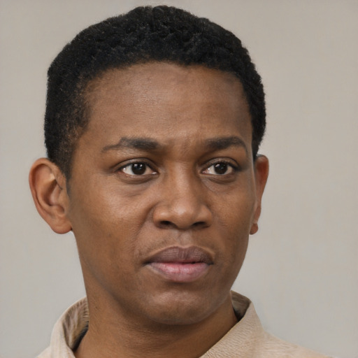 Neutral black adult male with short  black hair and brown eyes