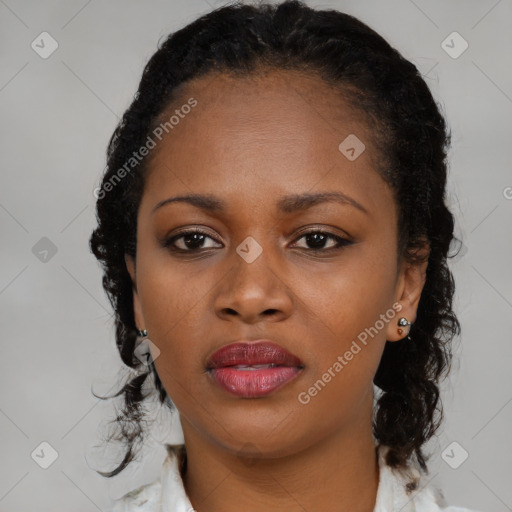 Neutral black young-adult female with medium  brown hair and brown eyes