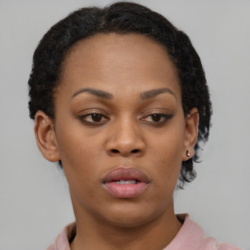 Neutral black young-adult female with short  brown hair and brown eyes