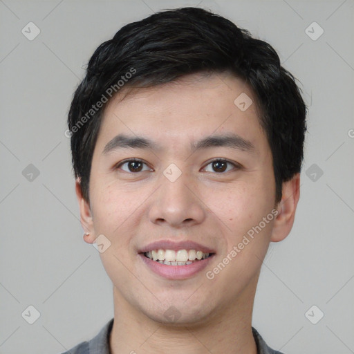 Joyful white young-adult male with short  black hair and brown eyes