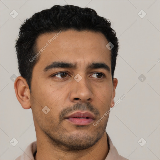 Neutral latino young-adult male with short  black hair and brown eyes