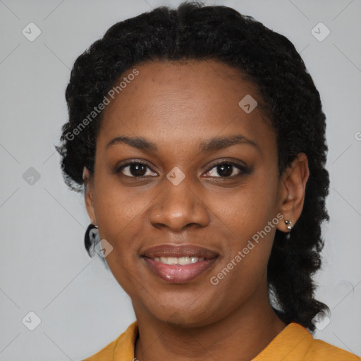 Joyful black young-adult female with medium  black hair and brown eyes