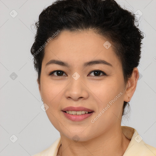 Joyful latino young-adult female with short  brown hair and brown eyes