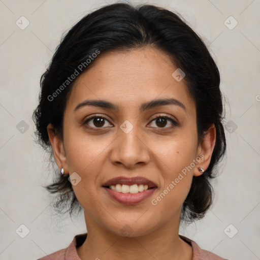 Joyful latino young-adult female with medium  brown hair and brown eyes