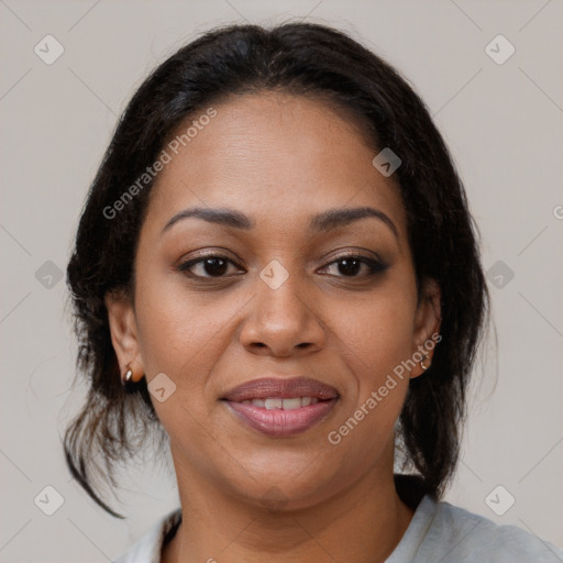 Joyful latino young-adult female with medium  brown hair and brown eyes