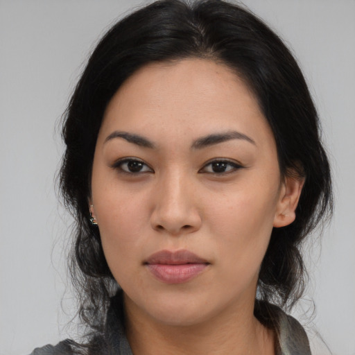 Neutral latino young-adult female with medium  black hair and brown eyes