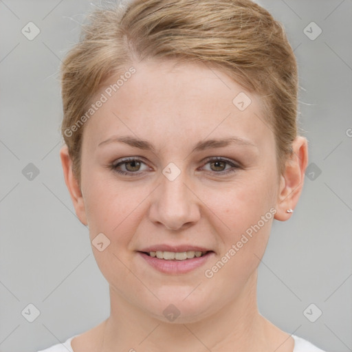 Joyful white young-adult female with short  brown hair and grey eyes