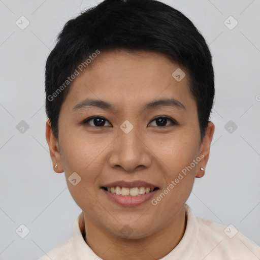 Joyful asian young-adult female with short  black hair and brown eyes