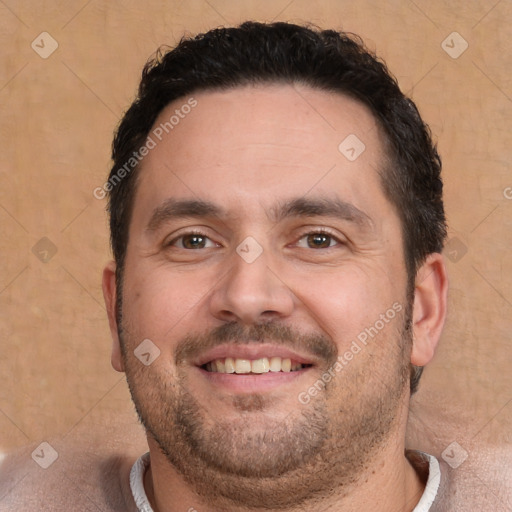 Joyful white adult male with short  brown hair and brown eyes