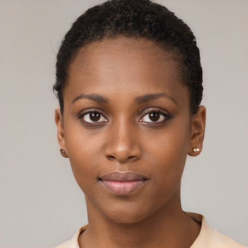 Neutral black young-adult female with short  black hair and brown eyes
