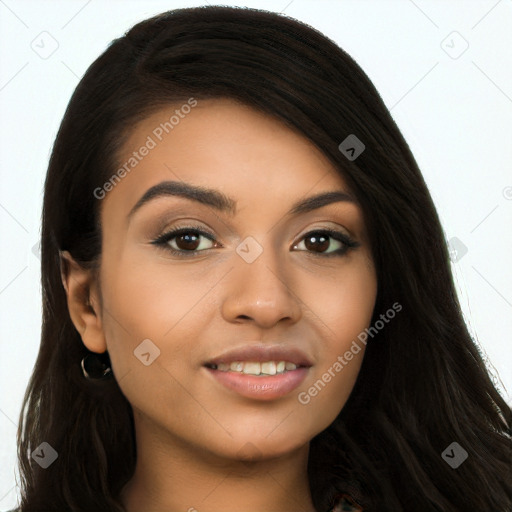 Joyful latino young-adult female with long  brown hair and brown eyes