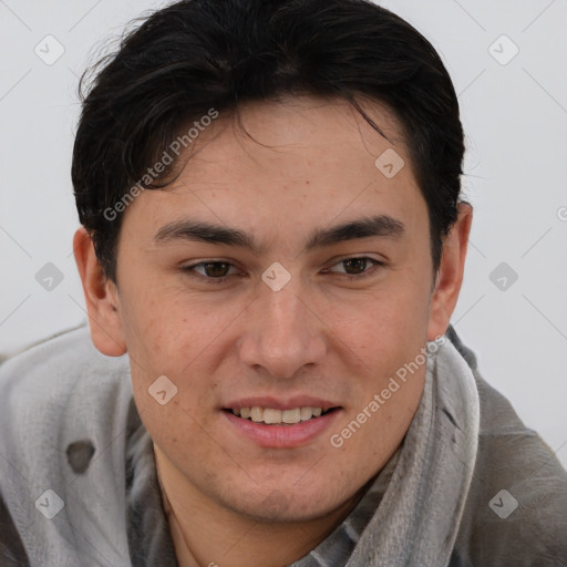 Joyful asian young-adult male with short  brown hair and brown eyes