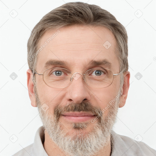 Joyful white adult male with short  brown hair and grey eyes