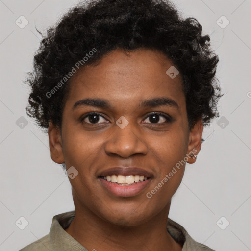 Joyful black young-adult male with short  brown hair and brown eyes