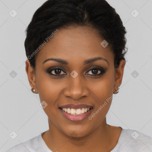 Joyful black young-adult female with short  black hair and brown eyes