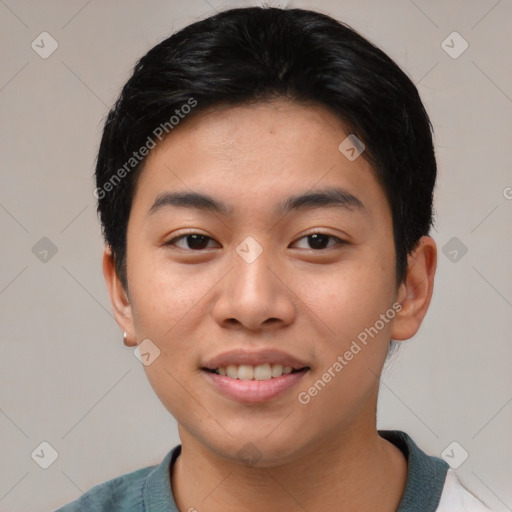 Joyful asian young-adult male with short  black hair and brown eyes