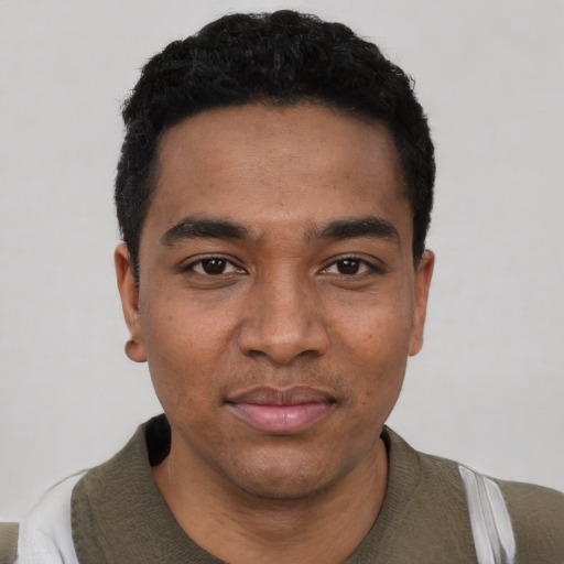 Neutral black young-adult male with short  black hair and brown eyes