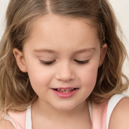 Joyful white child female with long  brown hair and brown eyes