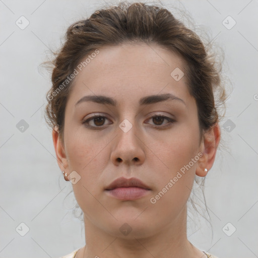 Neutral white young-adult female with short  brown hair and brown eyes