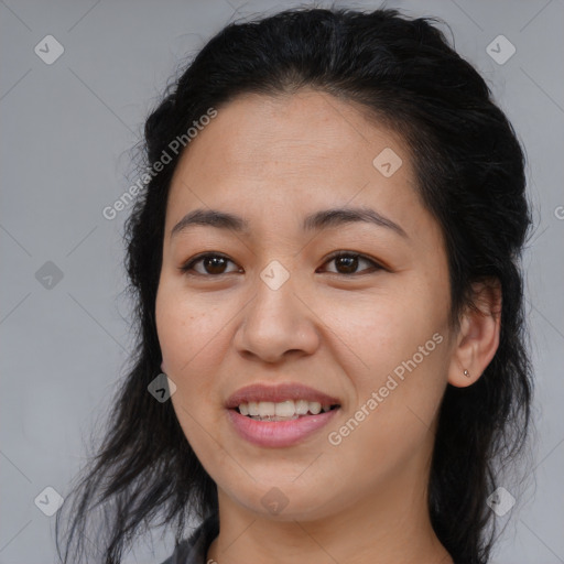 Joyful latino young-adult female with medium  brown hair and brown eyes