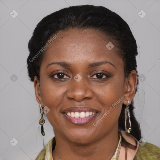 Joyful black young-adult female with medium  brown hair and brown eyes