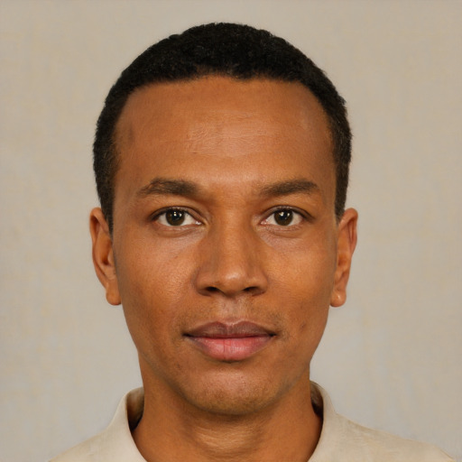 Neutral black young-adult male with short  black hair and brown eyes