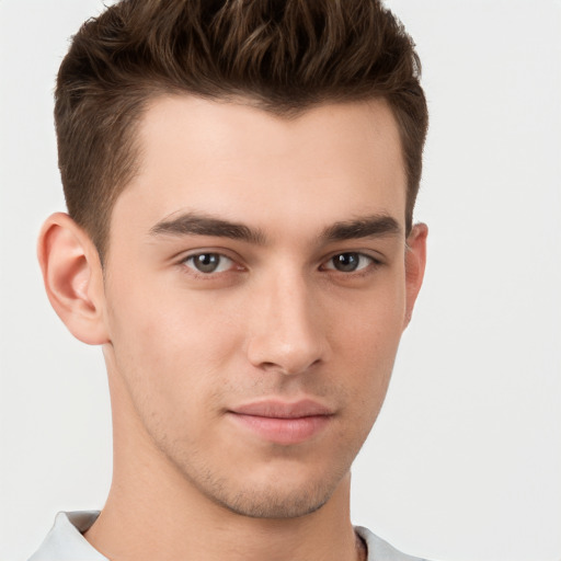 Neutral white young-adult male with short  brown hair and brown eyes