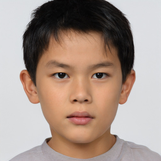 Neutral asian child male with short  brown hair and brown eyes