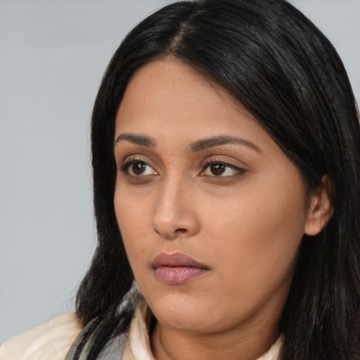 Neutral asian young-adult female with long  black hair and brown eyes