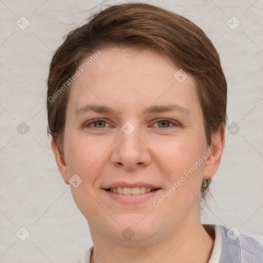 Joyful white young-adult female with short  brown hair and grey eyes