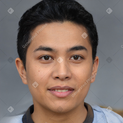 Joyful asian young-adult male with short  black hair and brown eyes