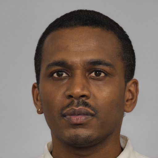 Neutral black young-adult male with short  black hair and brown eyes