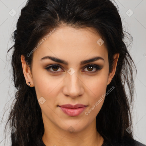 Joyful latino young-adult female with long  brown hair and brown eyes