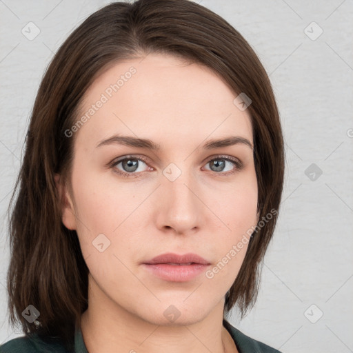 Neutral white young-adult female with medium  brown hair and grey eyes