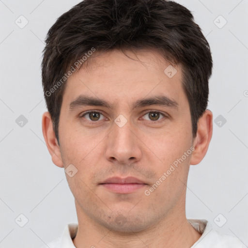 Neutral white young-adult male with short  brown hair and brown eyes