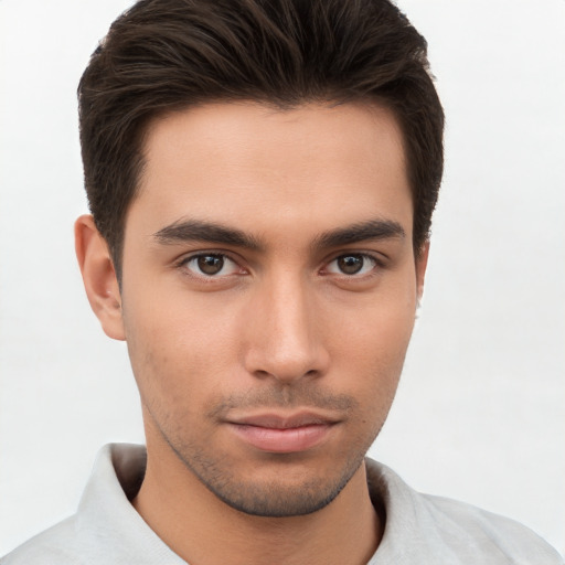 Neutral white young-adult male with short  brown hair and brown eyes