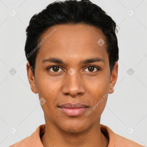 Joyful latino young-adult male with short  brown hair and brown eyes