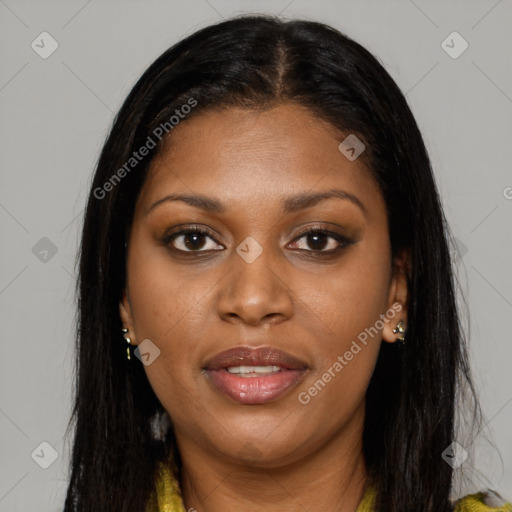 Joyful black young-adult female with long  brown hair and brown eyes