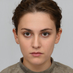 Neutral white young-adult female with short  brown hair and brown eyes