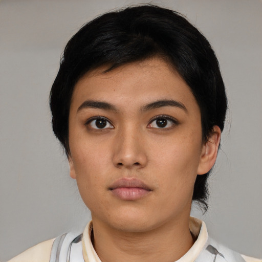 Neutral asian young-adult female with short  black hair and brown eyes