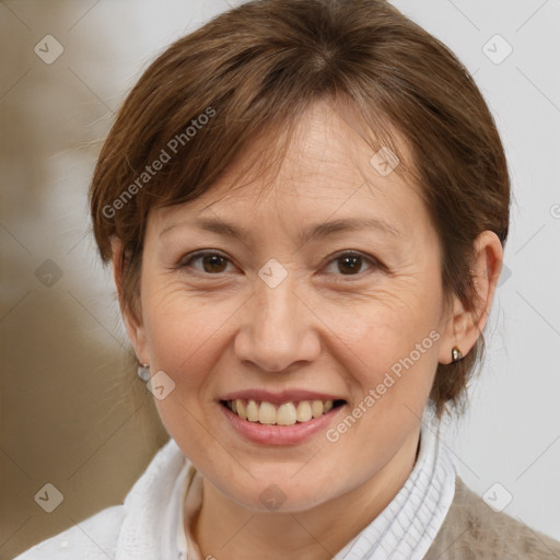 Joyful white adult female with medium  brown hair and brown eyes