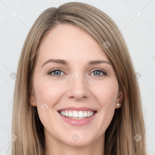 Joyful white young-adult female with long  brown hair and grey eyes