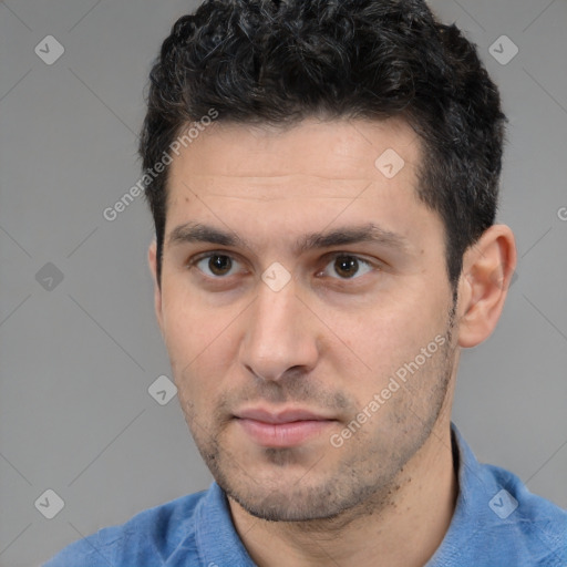 Neutral white young-adult male with short  black hair and brown eyes